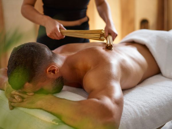 Massagem com bambu aquecido a domicílio – 60 minutos para 1 pessoa com 45% de desconto – Rio de Janeiro